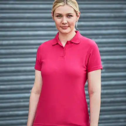 a woman in a pink shirt