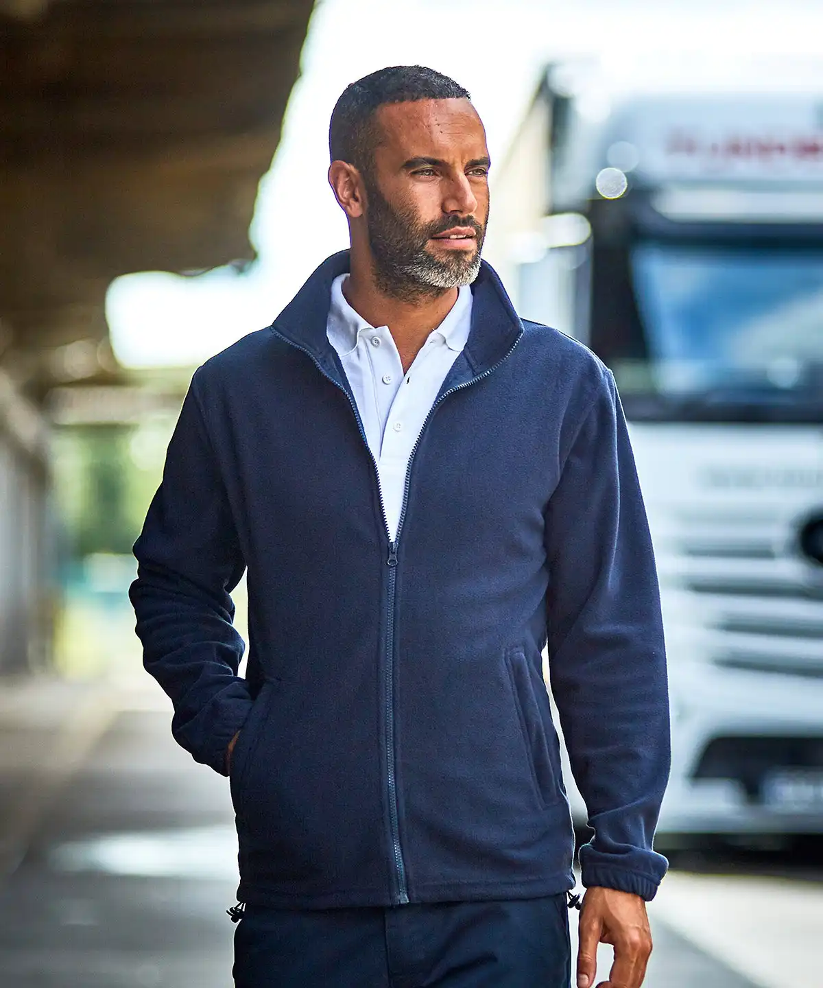 Pro Fleece Jacket a man in a blue jacket