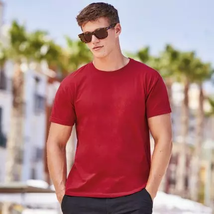 a man wearing sunglasses and a red shirt