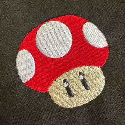 embroidered mushroom logo
